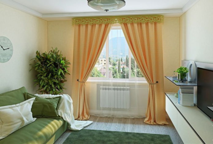 lambrequín verde con figuras en el interior