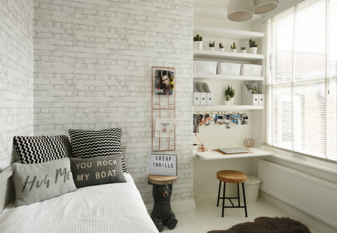 Habitación gris y blanca para un escolar