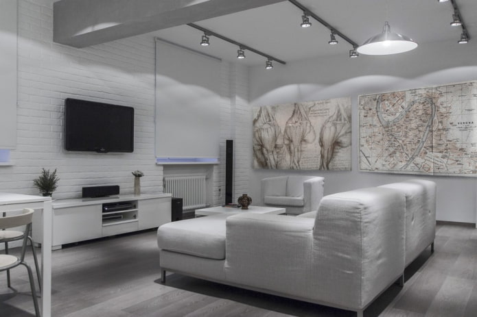 decoración e iluminación en el salón en tonos blancos