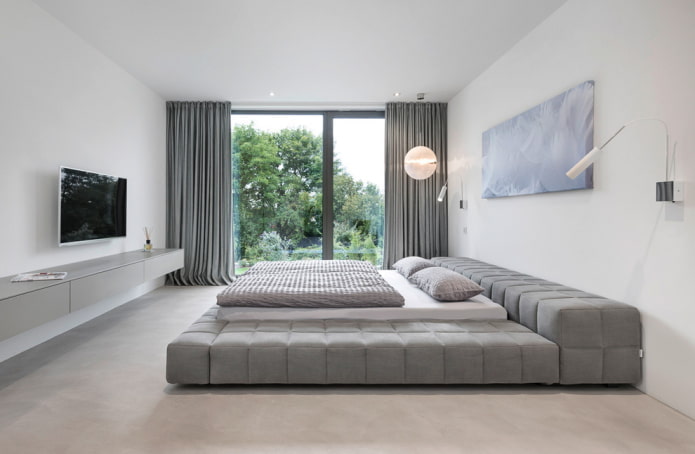 interior de dormitorio blanco y gris