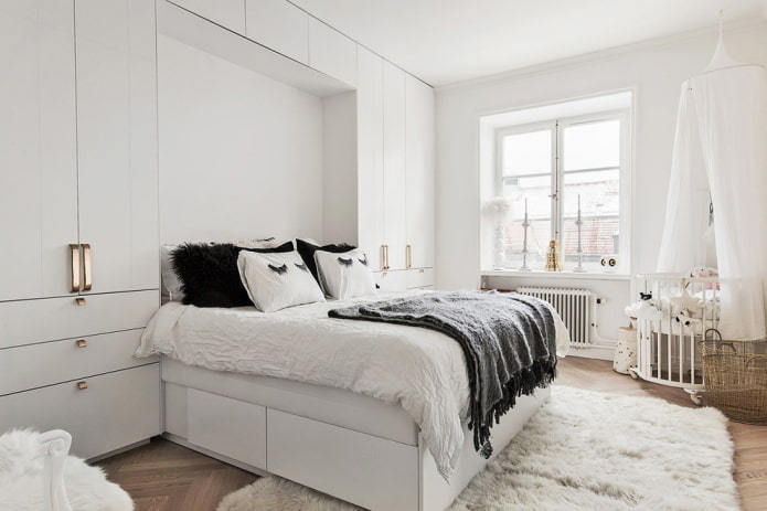 muebles en el interior de un dormitorio en tonos blancos