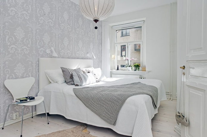 interior de dormitorio blanco y gris