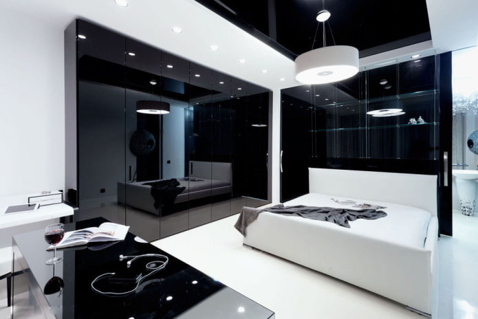 Muebles en el interior del dormitorio en tonos blanco y negro