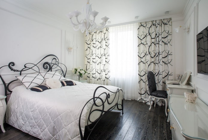 muebles en el interior del dormitorio en tonos blanco y negro