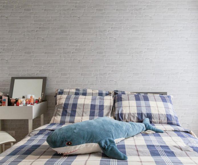 papel pintado de ladrillo en el interior del dormitorio