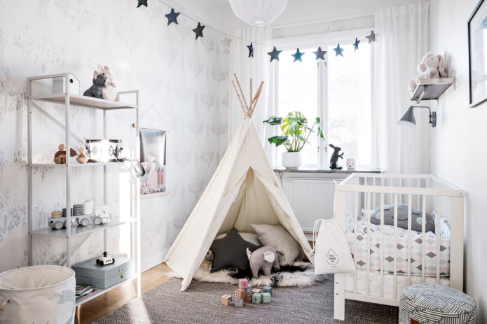 decoración y textiles en el interior de la habitación infantil para el bebé