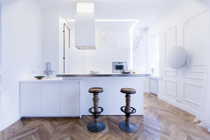 Interior de una cocina-salón combinada con barra Mostrador