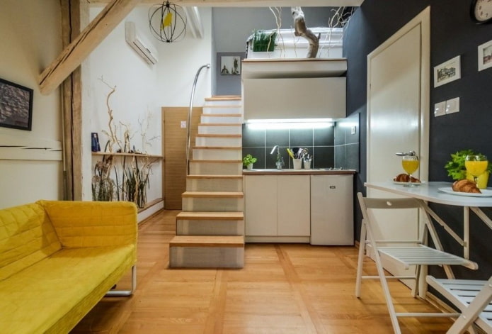 interior de un apartamento tipo estudio de dos niveles