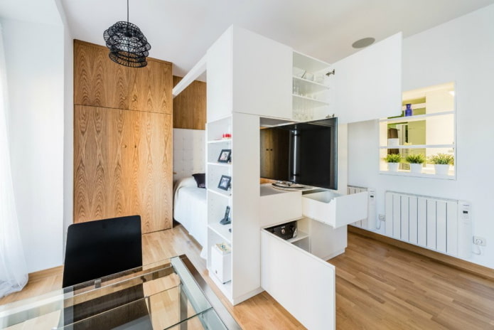 Disposición de los muebles en el interior de un apartamento tipo estudio