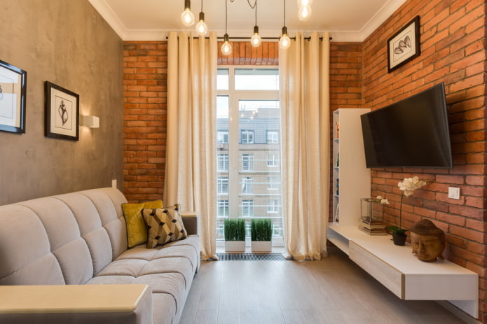 Interior de un salón de 16 metros cuadrados de estilo loft