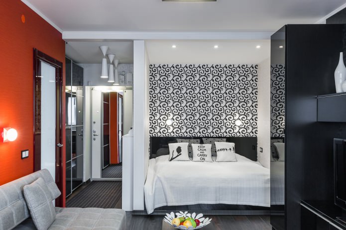 Dormitorio en el interior de un apartamento de una habitación de estilo moderno