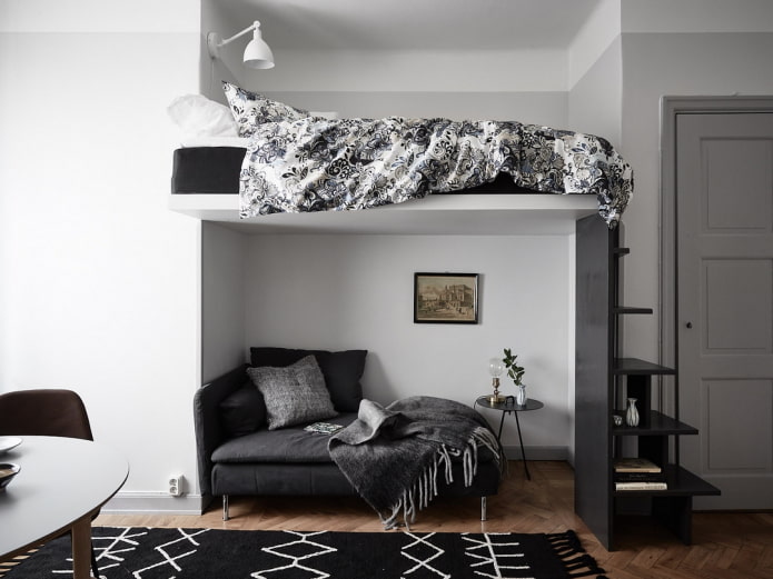 Disposición de muebles en un apartamento de una habitación con nicho
