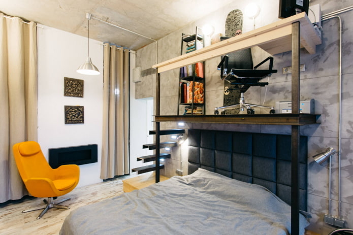 Loft con estudio sobre la cama