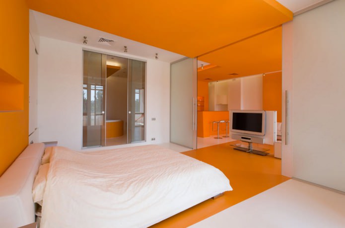 dormitorio blanco y naranja