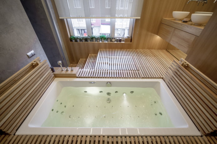 baño en un podio con ventana