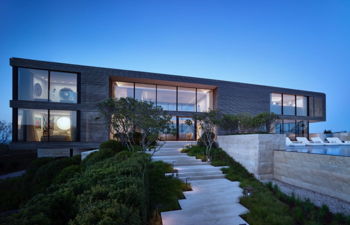 casa con techo plano en estilo de alta tecnología