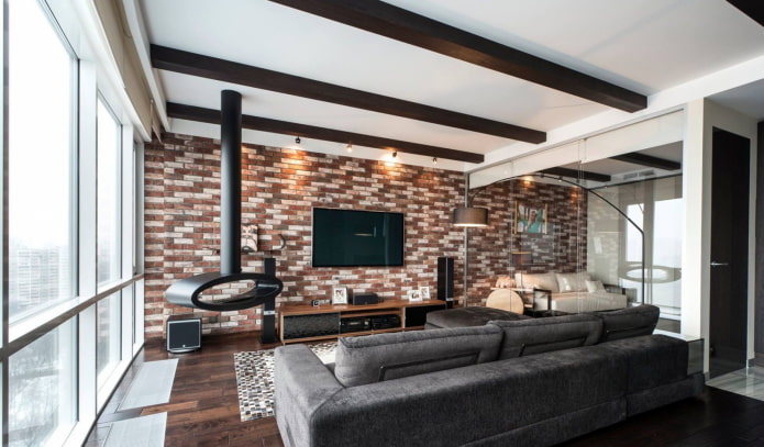 Chimenea y TV en el interior de la sala de estar en un estilo moderno