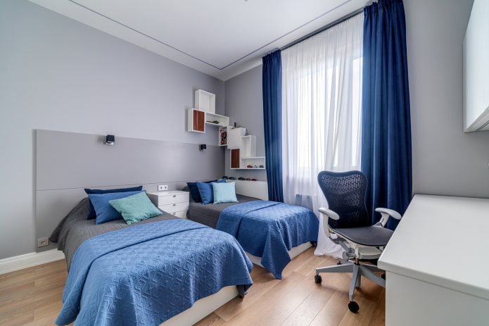 interior de una habitación infantil azul grisácea