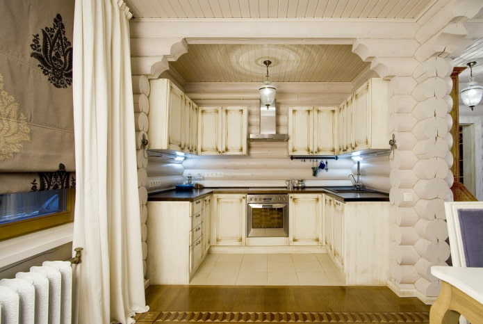 diseño de cocina en el interior de una casa de troncos