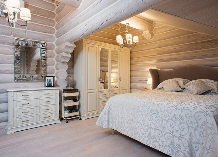 diseño de dormitorio en el interior de una casa de troncos