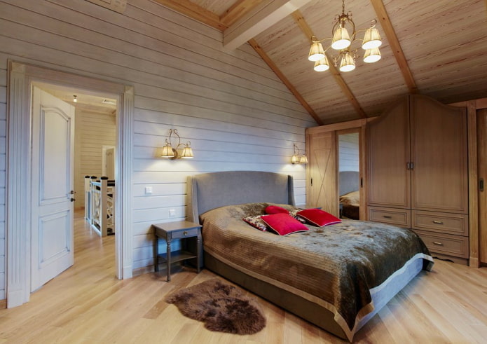 Diseño de dormitorio en el interior de una casa de troncos