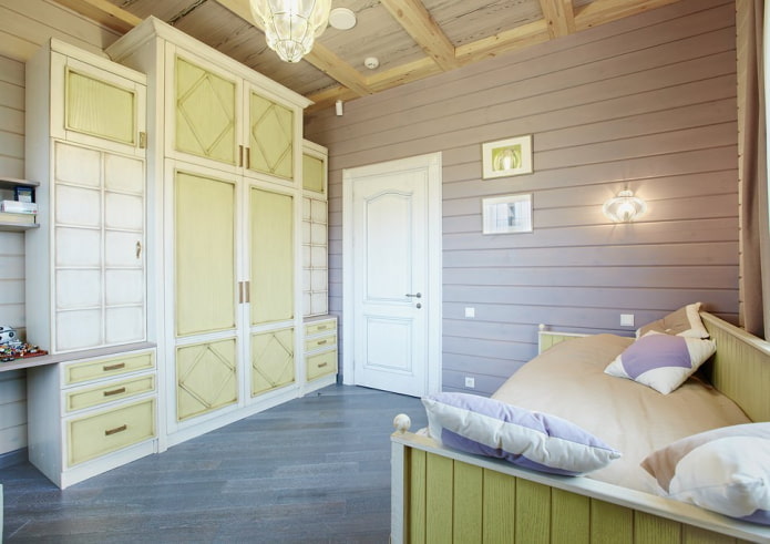 diseño de una habitación infantil en el interior de una casa de troncos