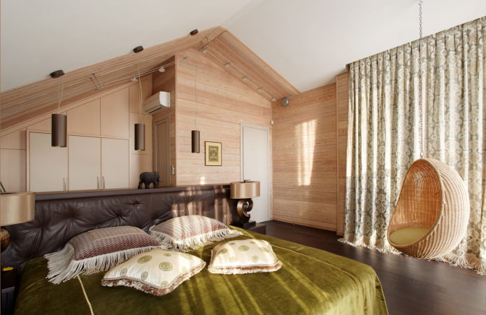 Diseño de dormitorio en el interior de una casa de troncos