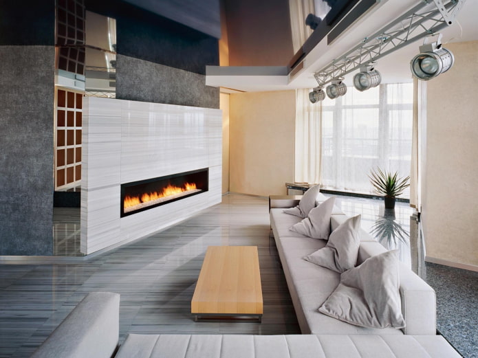 chimenea en el interior de la sala de estar en estilo de alta tecnología