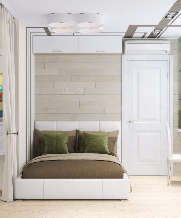 Dormitorio en un apartamento de una habitación de 33 m².