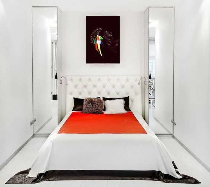 dormitorio estrecho y luminoso con cabecero suave