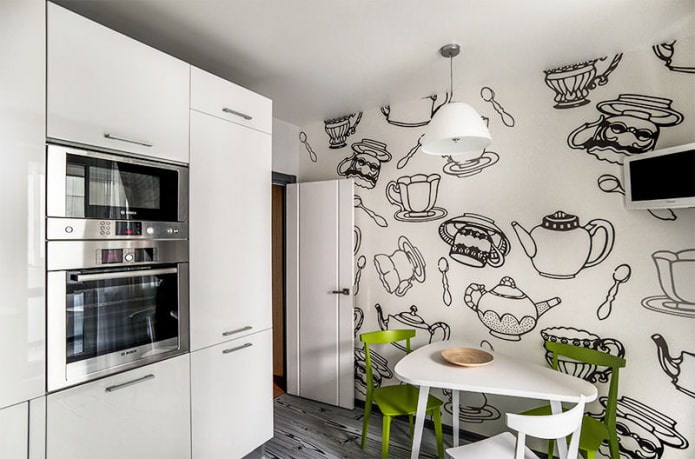 Interior de cocina en blanco y negro con verde