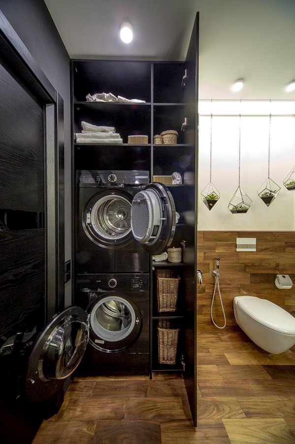 interior de baño moderno con lavadora y secadora