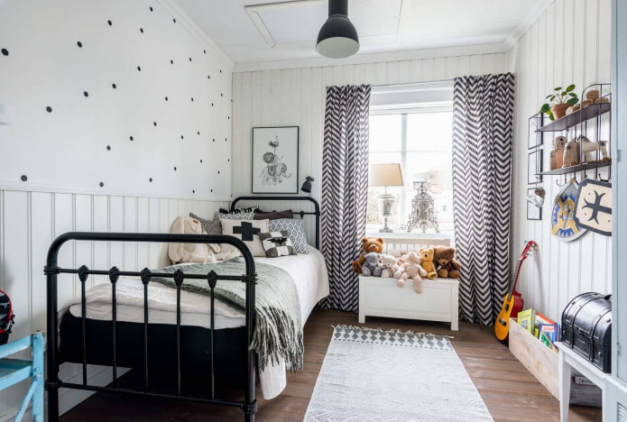 cama con forja en habitación infantil de estilo escandinavo