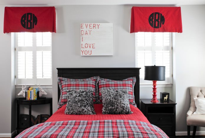 Interior de dormitorio en negro, gris y rojo