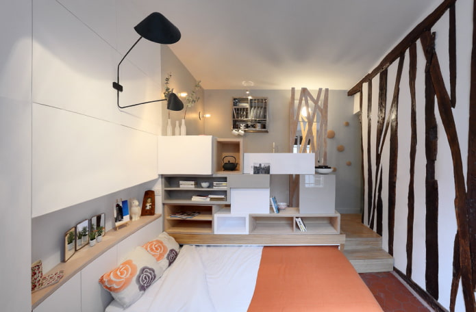 cama en un podio en el interior de la cocina