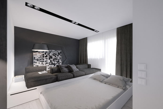 cama sobre un podio en el interior de la sala de estar