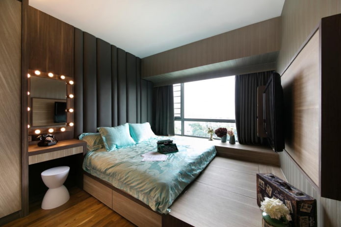 cama abatible en el interior del dormitorio