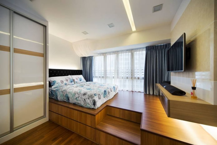 cama abatible en el interior del dormitorio