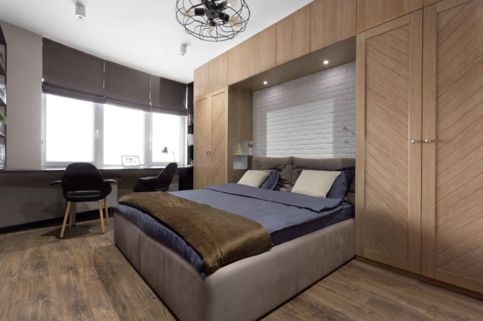 nicho de armarios con una cama en el interior