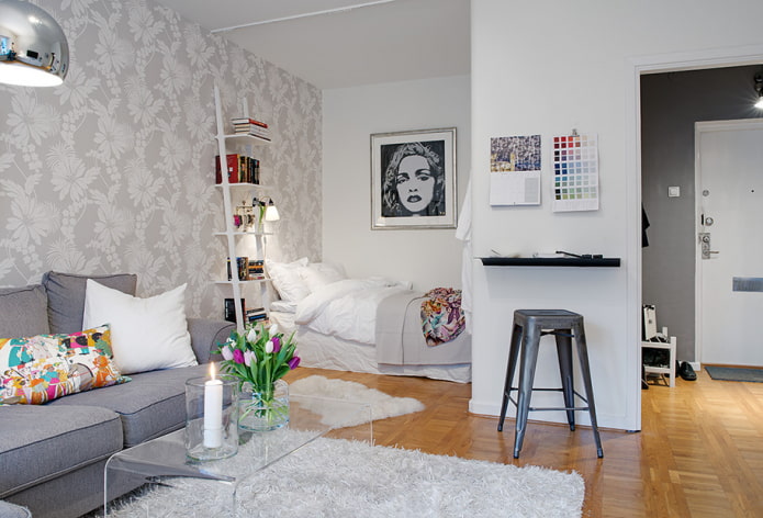 nicho con cama en un apartamento de una habitación