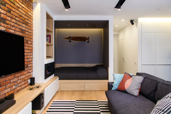 Nicho con cama en un apartamento de una habitación