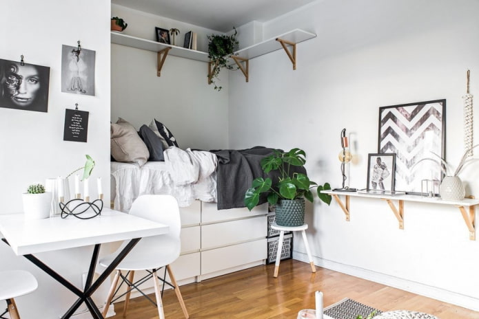 Nicho con cama en un interior de estilo escandinavo