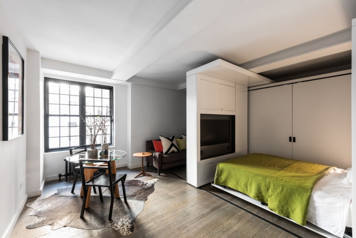 Apartamento espacioso de una habitación con cama