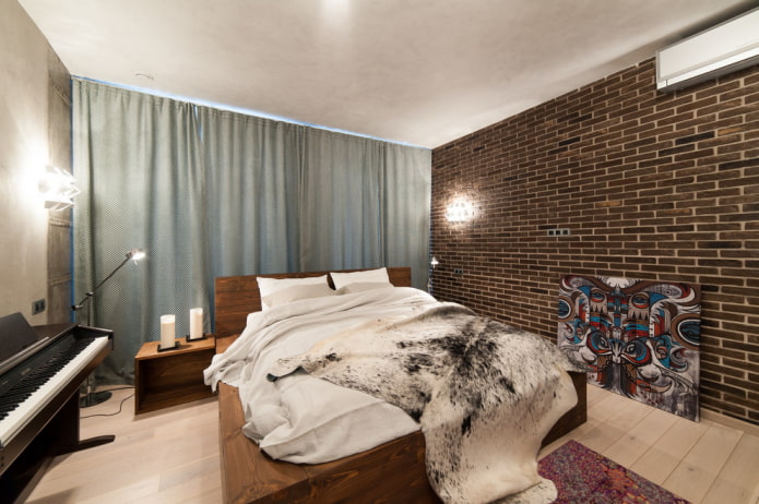 cama en un interior de estilo loft