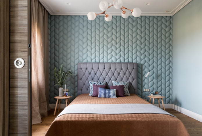 cama con cabecero mullido en un estilo moderno