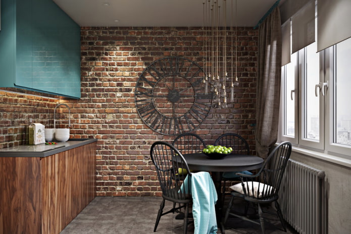 cocina muy pequeña con gabinetes de madera y una pared de acento de ladrillo decorativo