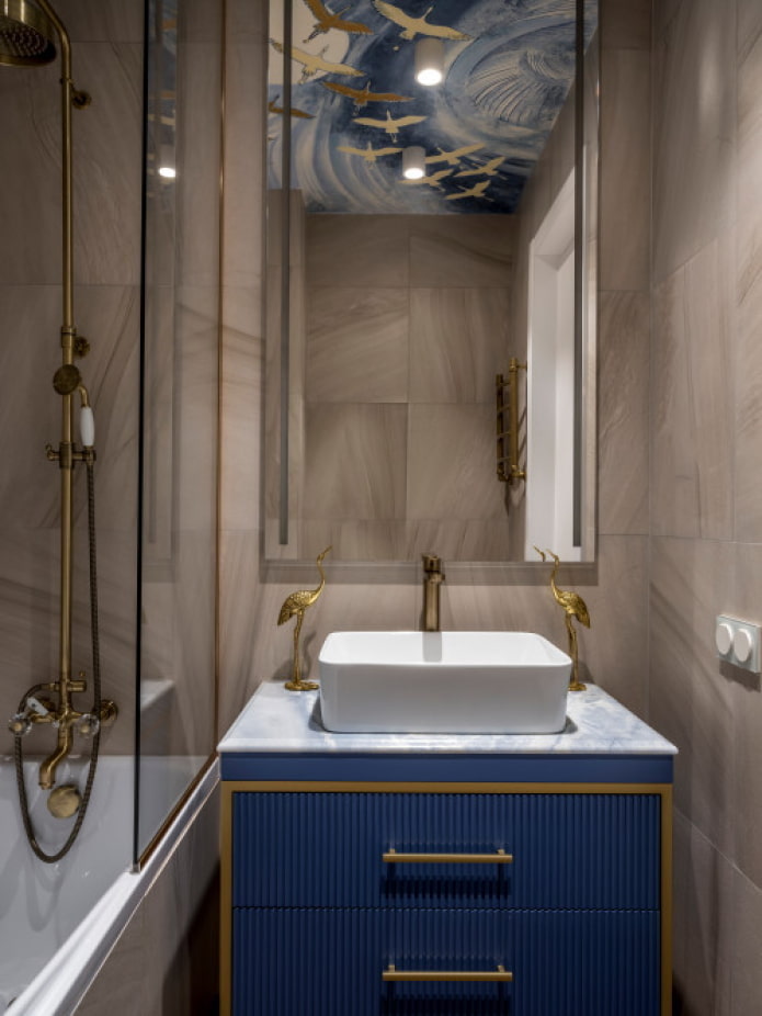 mueble brillante debajo del lavabo