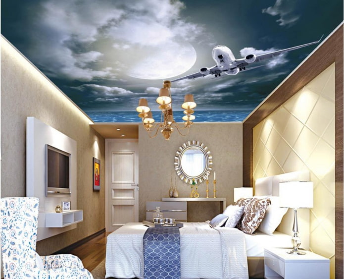 techo con la imagen del cielo y un avión en el dormitorio