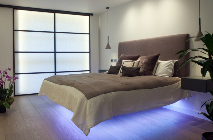 cama con efecto flotante e iluminación