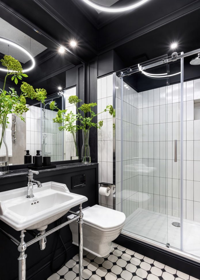 Baño en blanco y negro con pintura y azulejos